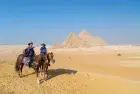 Horse ride panoramic viewpoint Giza — all three pyramids as your backdrop at sunset